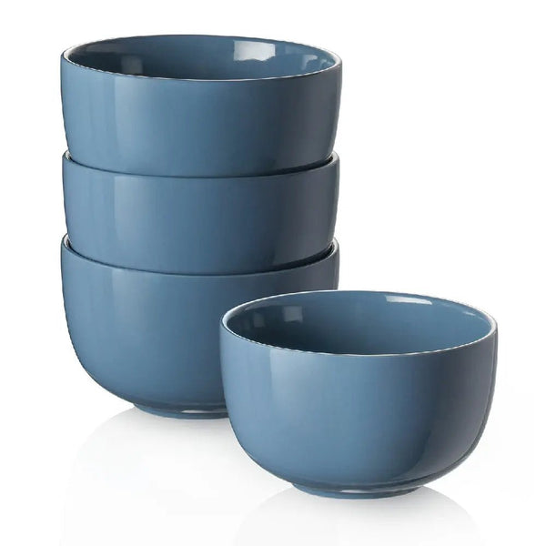 Set of blue ceramic bowls on a white background