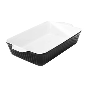 Black rectangular baking dish with white interior on a white background